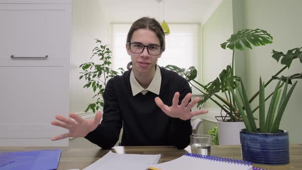 Male Teenager Talking Looking at Camera Smiling Emotional Tore Out and Wrinkled Sheet alt