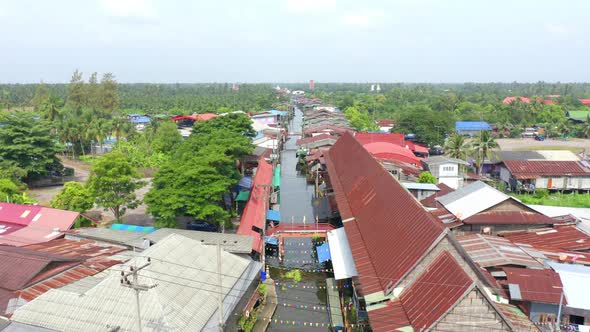 Aerial top view of local people at Damnoen Saduak Floating Market in Ratchaburi District, Thailand. alt