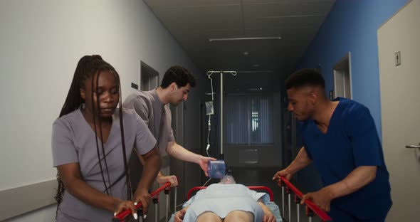 Medical Personnel Transport an Urgent Patient to the Emergency Room alt