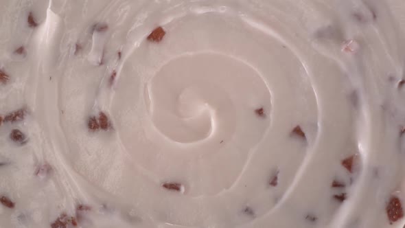 Swirling yogurt that made with strawberry - High-angle shot