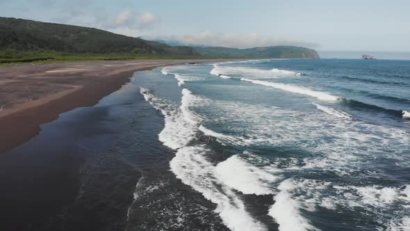 Top Down Aerial View of Giant Ocean Waves Crashing and Foaming alt
