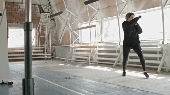 Woman Practicing Boxing alt