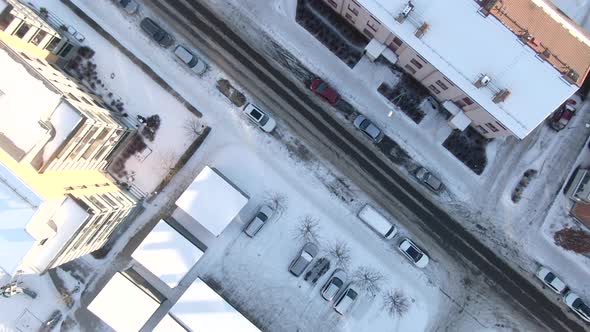 Top down aerial shot of Orebro city in Sweden. Snow covered roads and houses alt