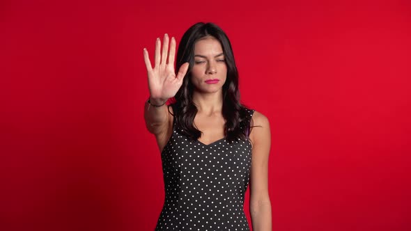 No, Never, Pretty Brunette Woman Disliking and Rejecting Gesture By Stop Sign alt