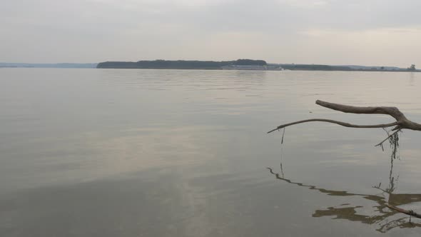 Cruise boat passing by village of Brza Palanka in Eastern Serbia 4K 2160p UHD footage - Cruises on D alt