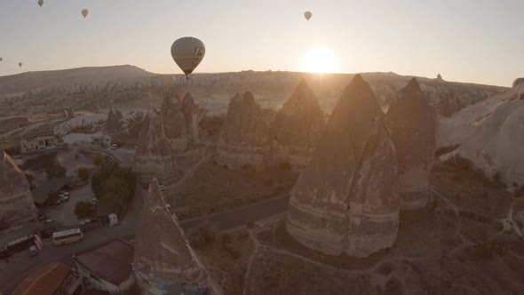 Cappadocia Aerial Shot of Rock Chimneys and Uchisar Castle in Goreme Turkey alt