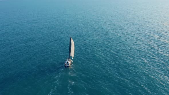 Aerial View Yacht Sailing On Opened Sea Sailing Boat Yachting Video Footage Yacht From Above 