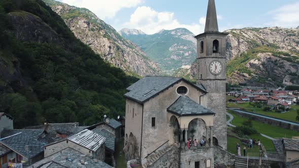 Vertical Sliding Shot of European Mountain Town with Medieval Architecture alt