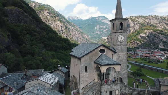 Vertical Sliding Shot of European Mountain Town with Medieval Architecture
