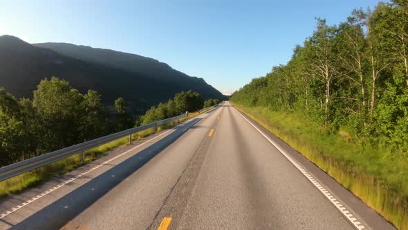 Vehicle Pointofview Driving a Car on a Road in Norway alt