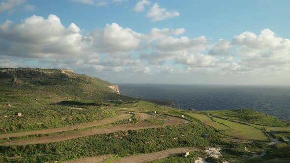 AERIAL: Revealing Coastline with Roaring Mediterranean Sea Splashing Waves on Rocks alt