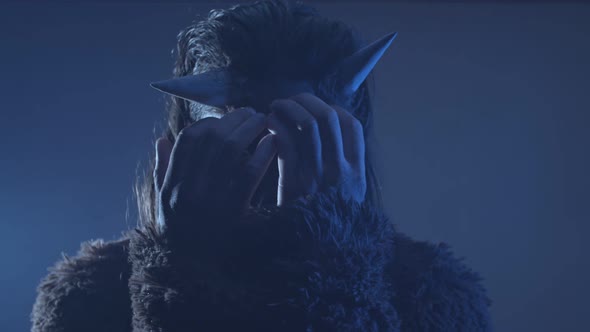 The Creepy Horned Fiend Removes His Hands From His Muzzle and Stares Straight Into your Soul alt