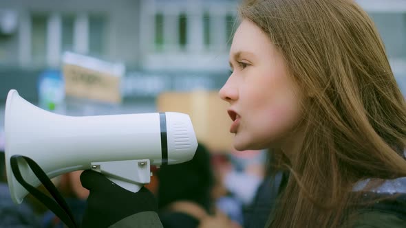 Angry Feminist Girl. Megaphone Scream. Woman Feminism. Shout Loudspeaker Strike alt