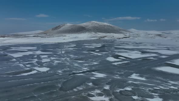 Aerial view of frozen Lake Madatapa in Javakheti National park, Georgia alt