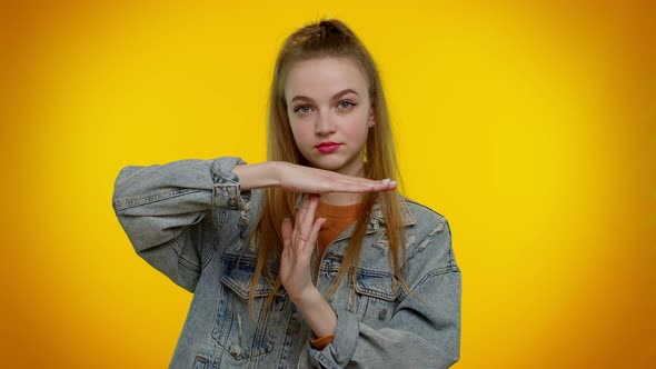 Tired Serious Teen Girl Showing Time Out Gesture Limit or Stop Sign No Pressure i Need More Time alt