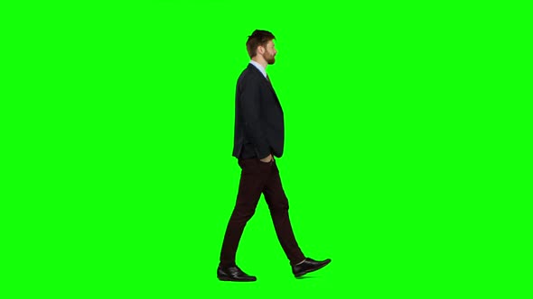 Man Walks Calmly Down the Street, He Is Happy. Green Screen alt