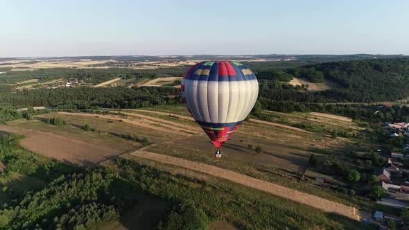 Aerial 4k footage of Hot Air Ballon flying above beautiful landscapes in Europe