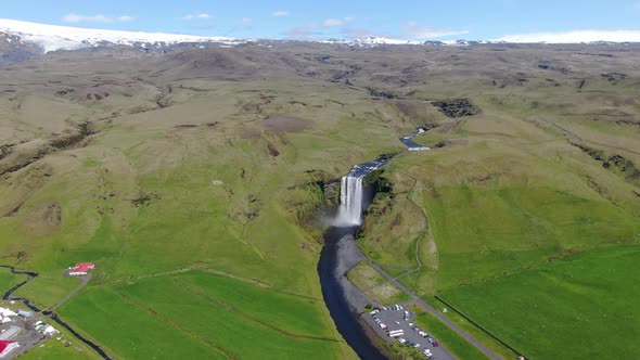 Long aerial shot of Skogafoss waterfall in Iceland, Europe alt