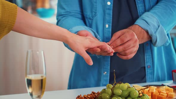 Placing the Ring on Her Finger alt
