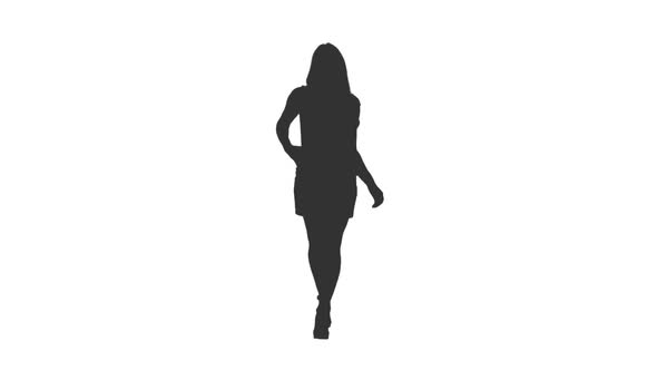 Silhouette of Young Woman Walking in Mini Dress 