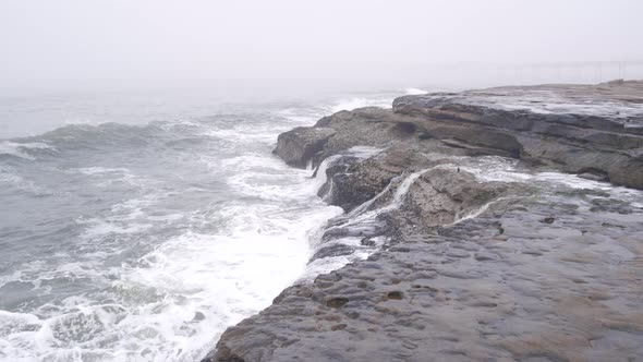Foggy Sea Landscape Waves Crashing on Ocean Beach in Haze