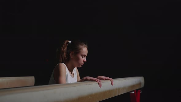 Sporty Preteen Girl is Performing on Balance Beam Portrait of Athletic Child on Apparatus, Stock Footage