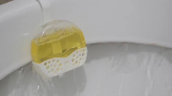 Water over toilet air freshener slow motion   footage