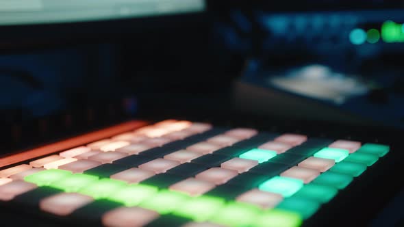 Music Producer Working on Drum Controller alt