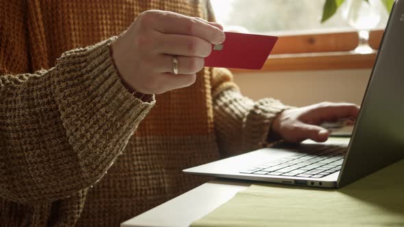 Closeup of an Online Purchase with a Credit Card Number Entered on a Laptop alt