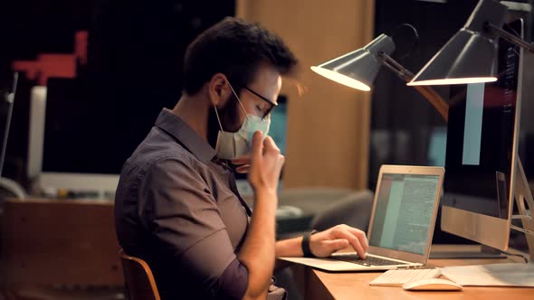 Businessman In Face Mask On Epidemic Coronavirus. Man In Face Mask On Office Lockdown. Webinar. alt