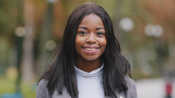 Front View Close Up Mixed Race Young Woman Beautiful Model Female Face with Black Skin Afro Teen alt