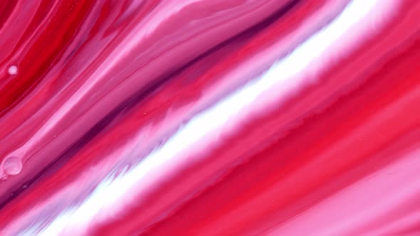 White and Pink Acrylic Paint Mixed in Water  alt