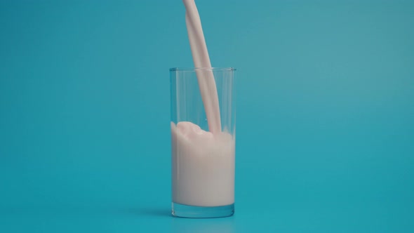 Slow Motion of Pouring Milk in Transparent Glass at 1000 Fps alt
