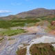 Drone shot of Haukadalur valley - home to geysers and other hot springs, Iceland - VideoHive Item for Sale