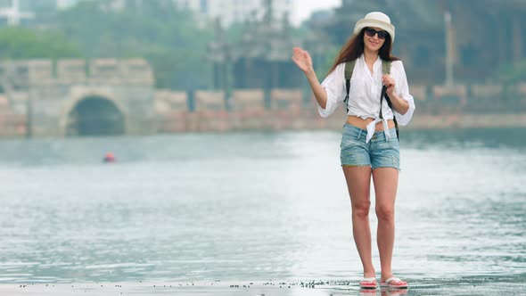 Young Beautiful Stylish Woman Traveling in Asia alt