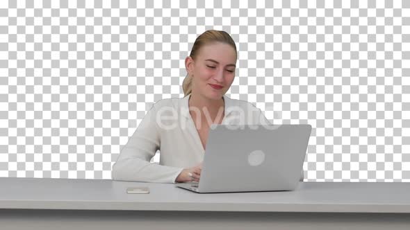 Businesswoman working on modern laptophaving, Alpha Channel
