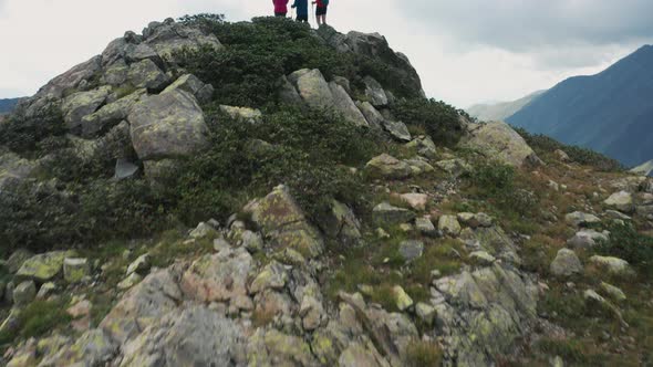 Aerial view of group of tourist on mountain top