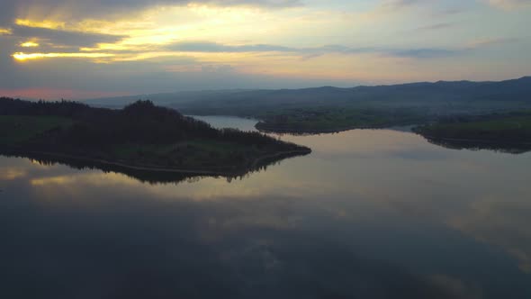 Establishing Dolly In, Lake Czorsztyn in Poland on Sunset, Aerial View alt