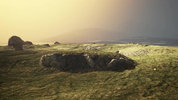 Mountain Landscape at Sunset with Tone in the Foreground on the Field alt