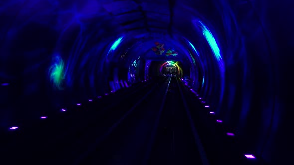 Shuttle Trains in Bund Sightseeing Tunnel. Metro Subway Train in City. Tunnel of Lights Under
