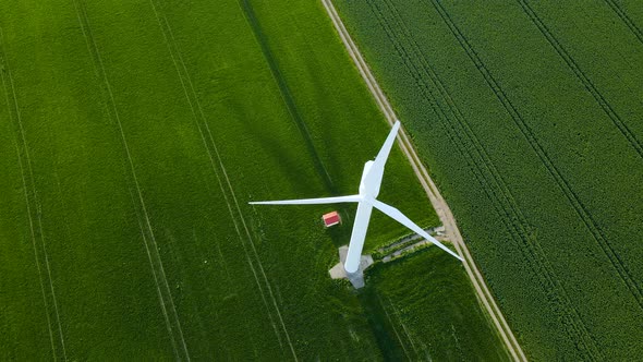 Wind turbine on a windless day. The broken wind turbine doesn't work under the wind, Wind turbine bl alt
