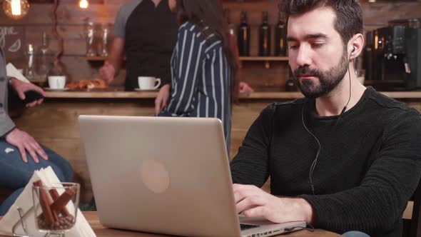 Portrait of a Young Caucasian Male Working on His Business Remotely alt