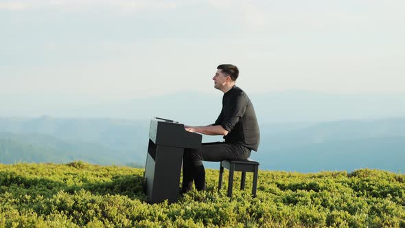 Pianist Plays in Beautiful Grand Piano in the Mountains