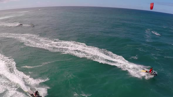 Aerial view of lifeguard surf rescue jet ski personal watercraft in Hawaii alt
