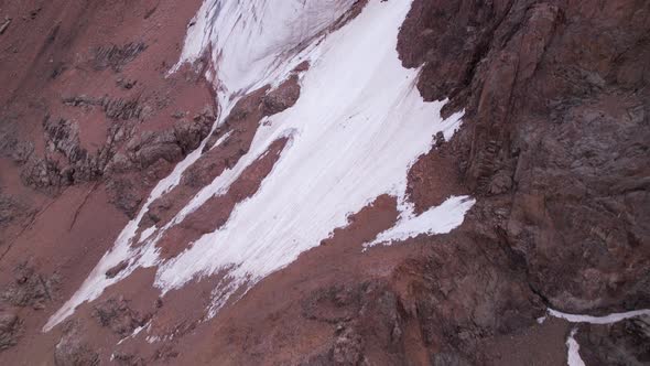High Rocky Mountains Covered with Ice in Places alt