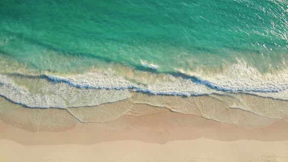 Aerial Top View of Sand Beach and Blue Sea