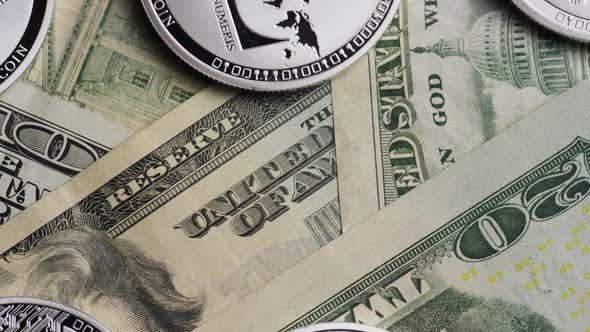 Rotating shot of Bitcoins (digital cryptocurrency) - BITCOIN LITECOIN alt