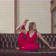 Flexible Funny Woman Sitting in Heron Pose on Couch - VideoHive Item for Sale