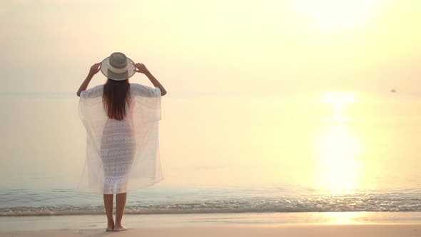 Asian woman enjoy around beautiful beach sea ocean alt