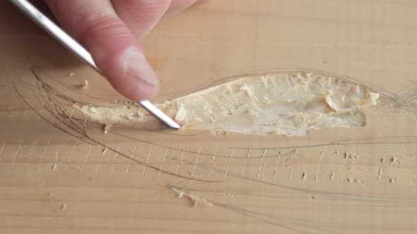 Closeup shoot of a woodcarver at work